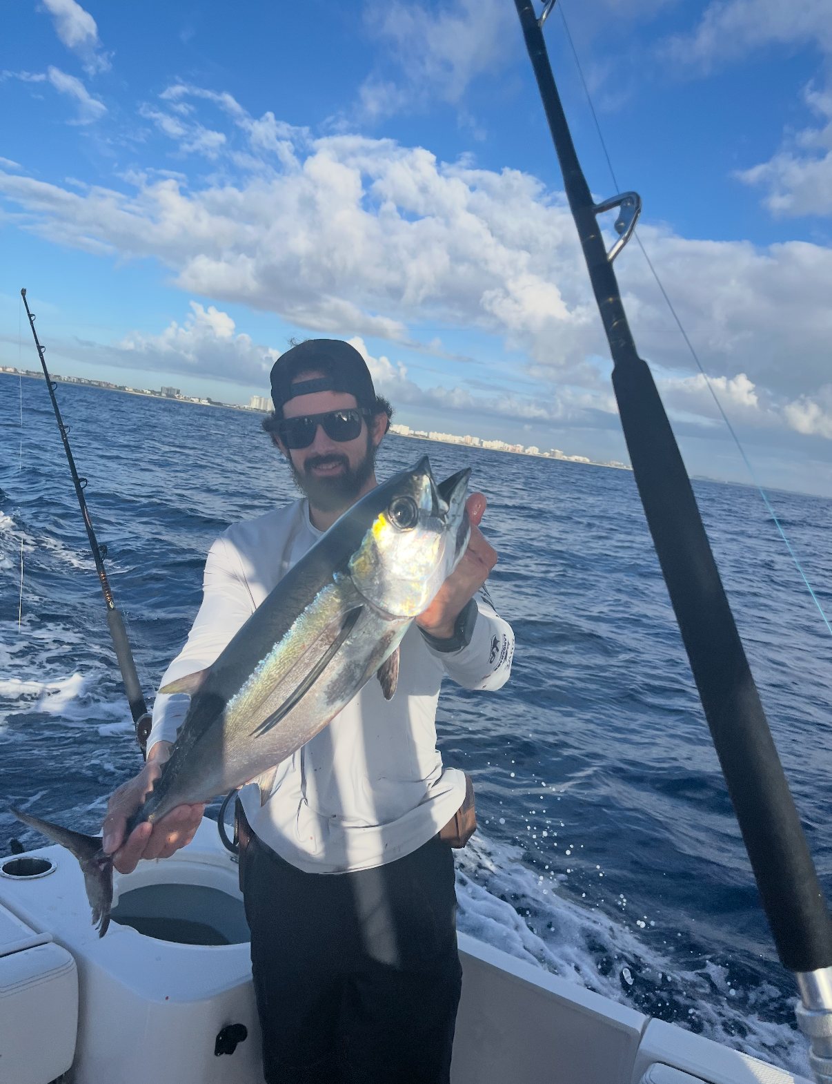 Angler showing a fish caught offshore